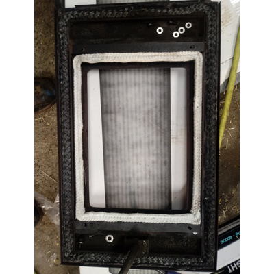 Customer photo of white self adhesive wood stove window gasket installed