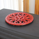 7" Sunburst Trivet With Red Baked Enamel Finish installed